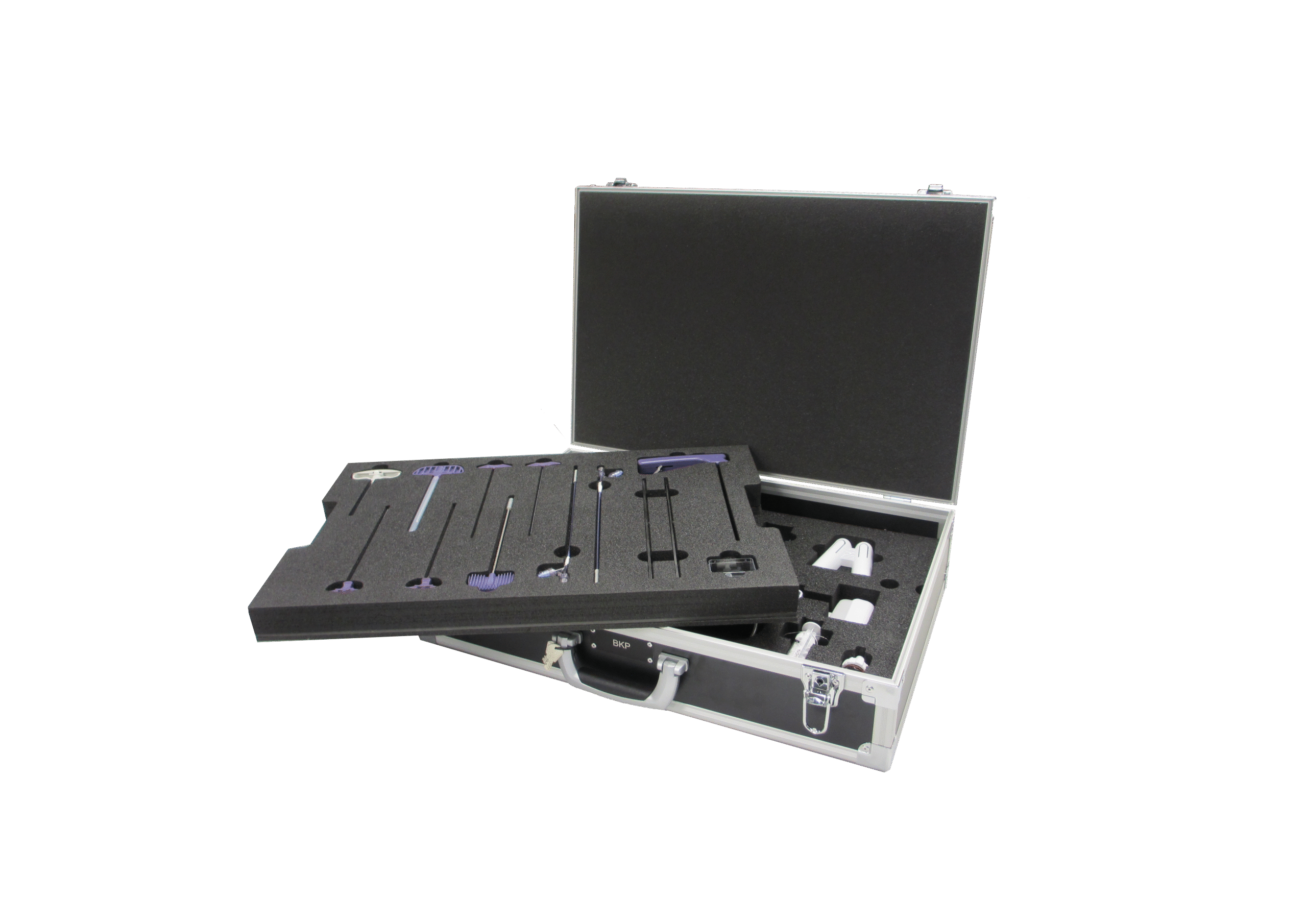 Presentation case with black foam interior and medical instruments